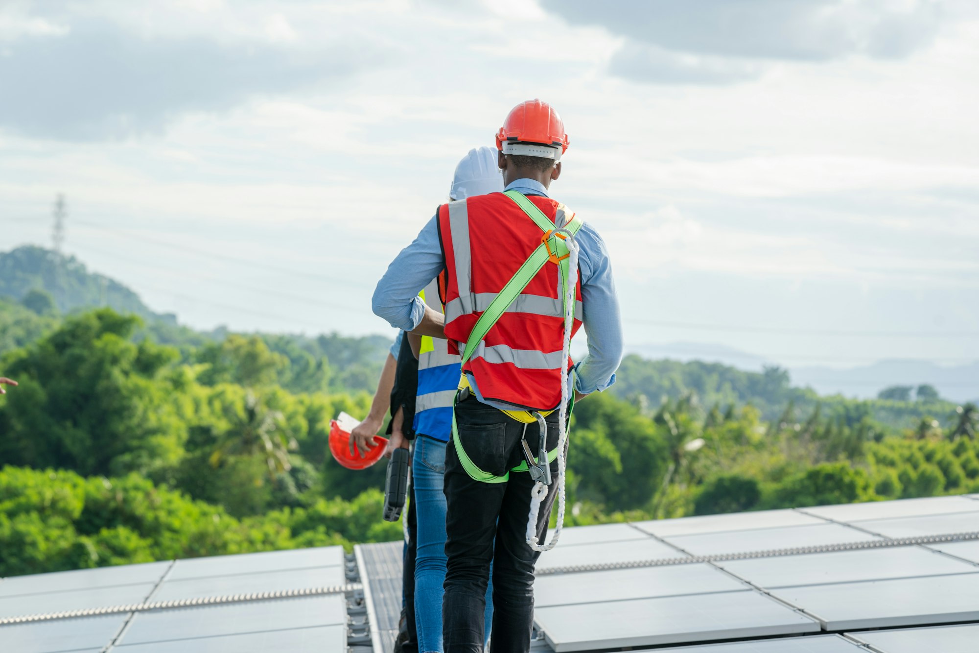 Technicians inspection inspect solar panels on the roof at Solar Power Station.